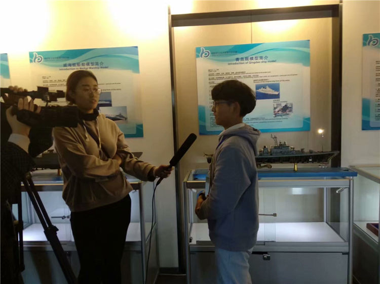 1541728226462055981.jpg 威海电视台采访.jpg